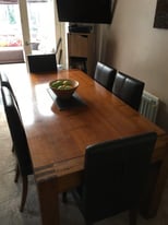 Oak dining table + 6 chairs brown leather.