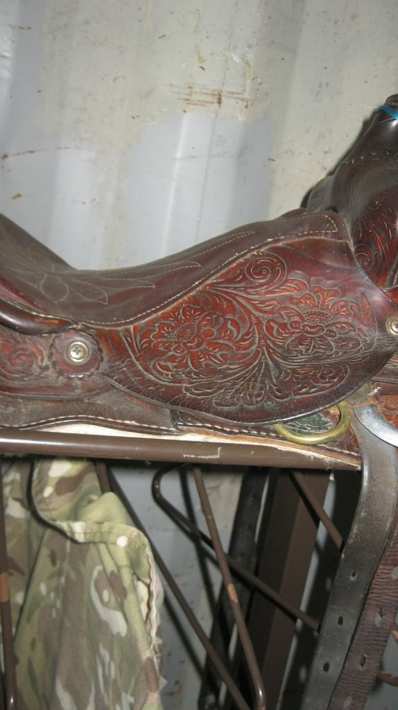 image for CARVED ORNATE BROWN LEATHER PONY SIZE WESTERN STYLE SADDLE. GOOD ORDER