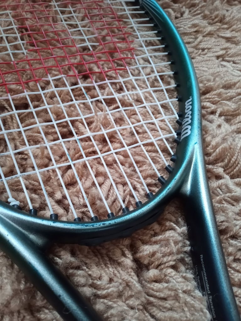 Tennis racquet, barely used 