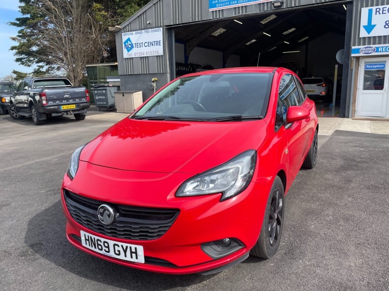 VAUXHALL CORSA 1.4 GRIFFIN with full main dealer service history, bright red,