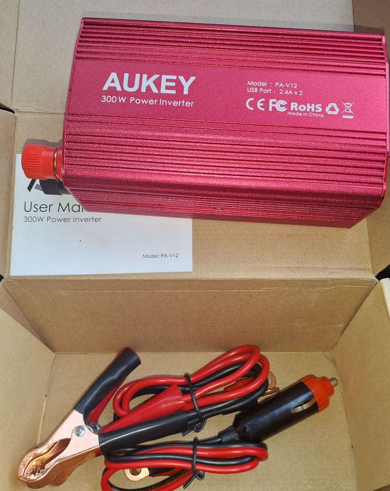  In vehicle 12v DC to 240v AC power unit (300w). 2 x USB ports. 2 sets of cables.