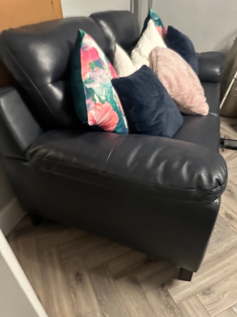 Two sofa,s ones a two seater the others a lazy boy sofa