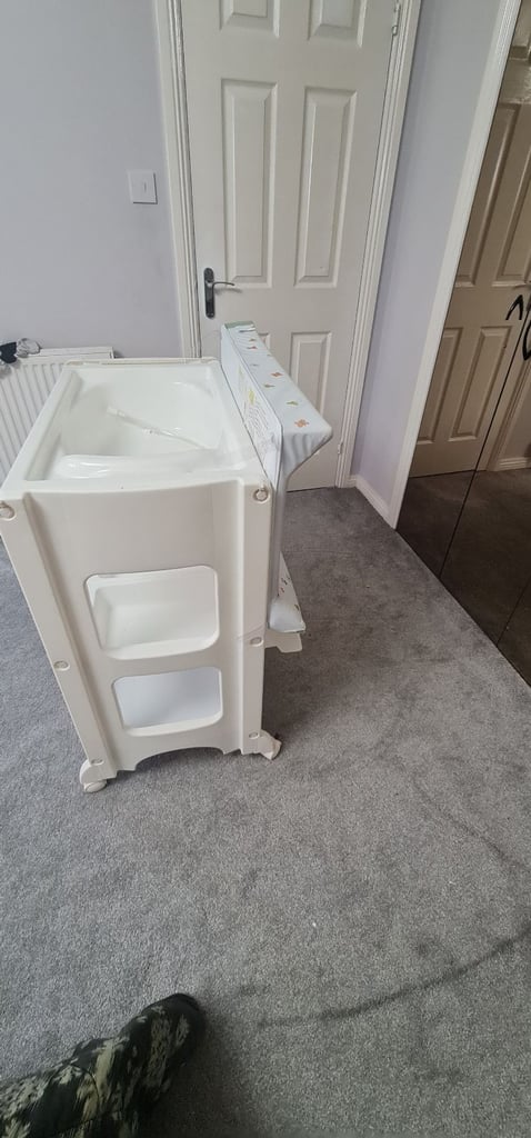 Baby changing and bathing station