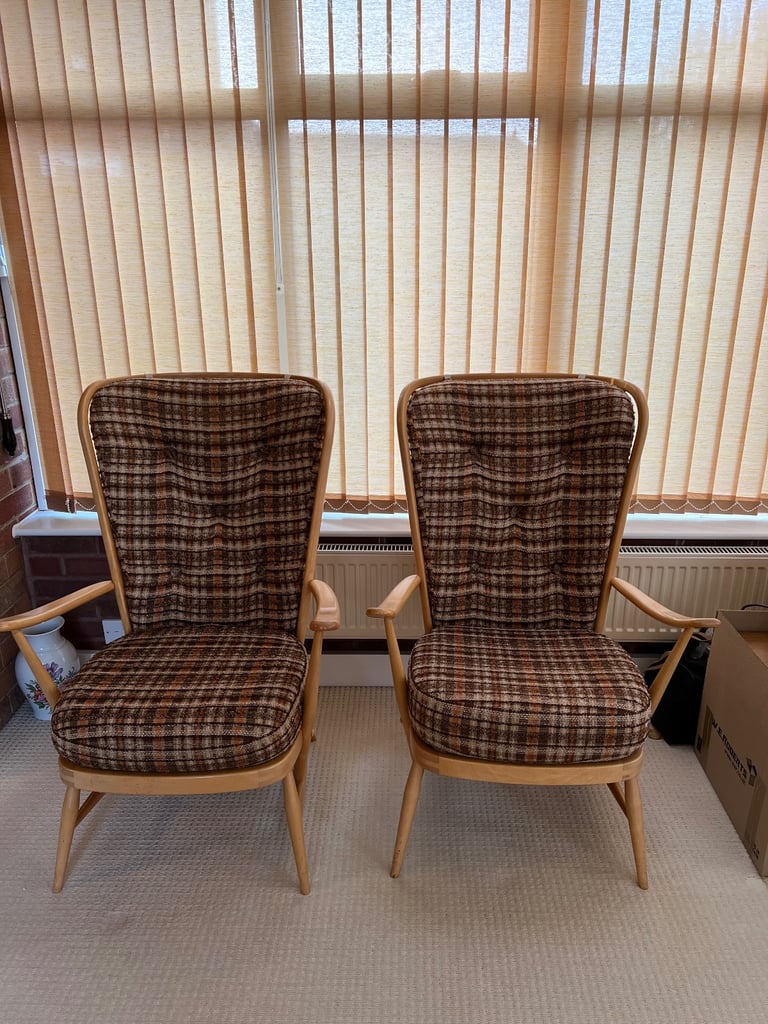 Two Ercol Tall Back Easy Chairs