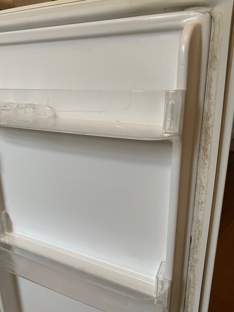 Small fridge with freezer compartment