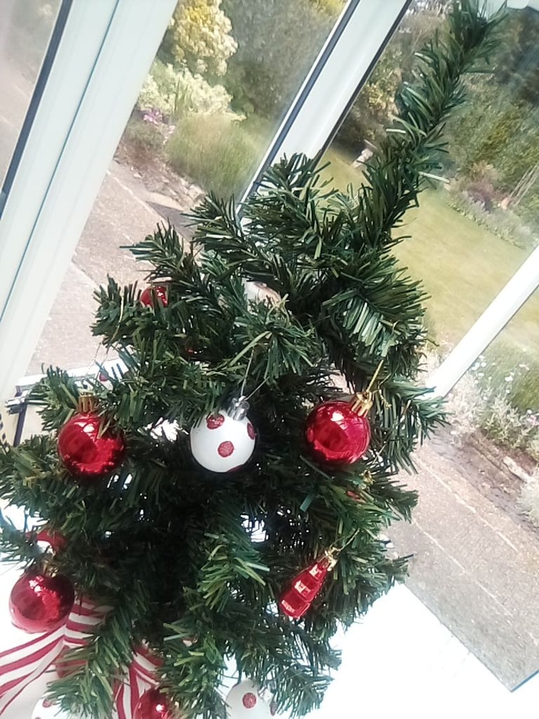 As new small Christmas tree with hanging baubles etc included.