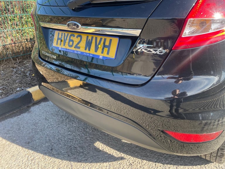 FORD FIESTA 1.4 ZETEC TITANIUM 62 REG 5 DOOR 12 MONTHS MOT LOW INSURANCE 48+ MPG