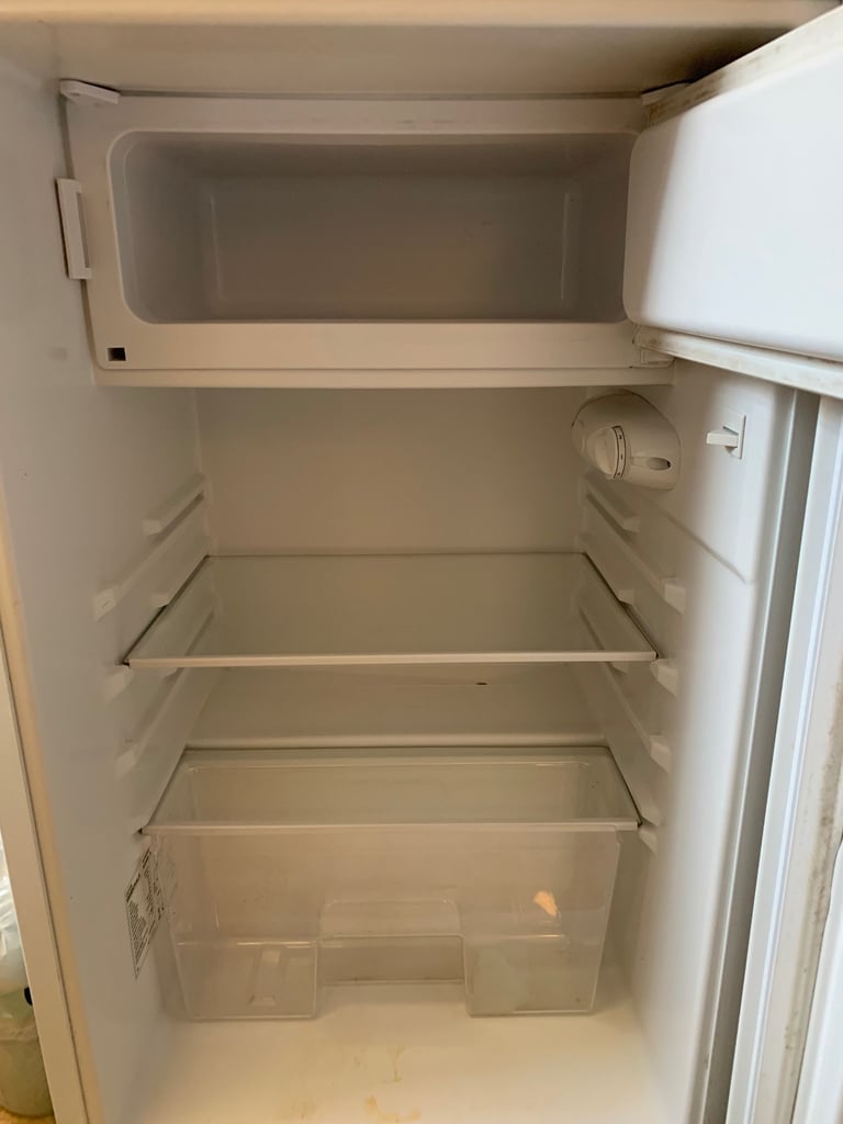 Small fridge with freezer compartment