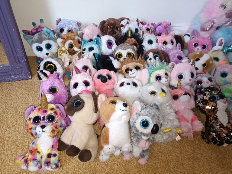 78 mixed sized TY teddies 