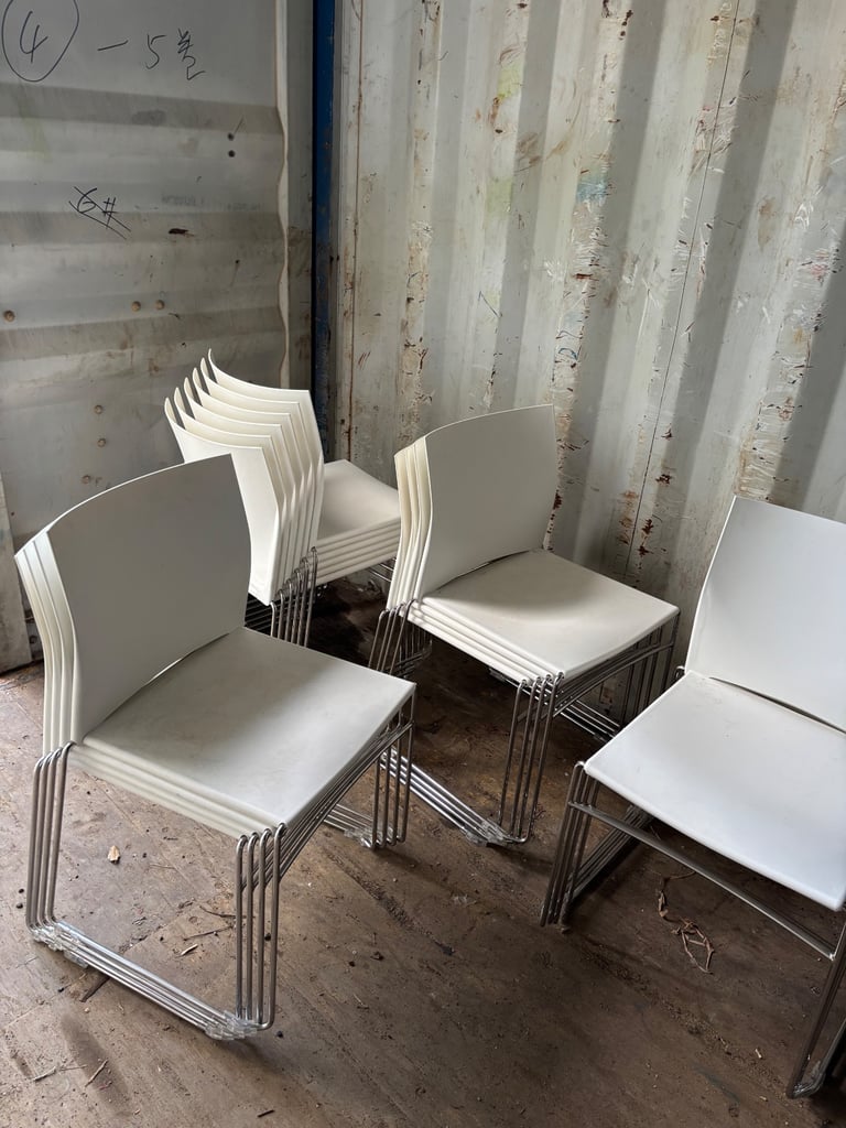 image for 19 white plastic chairs for sale