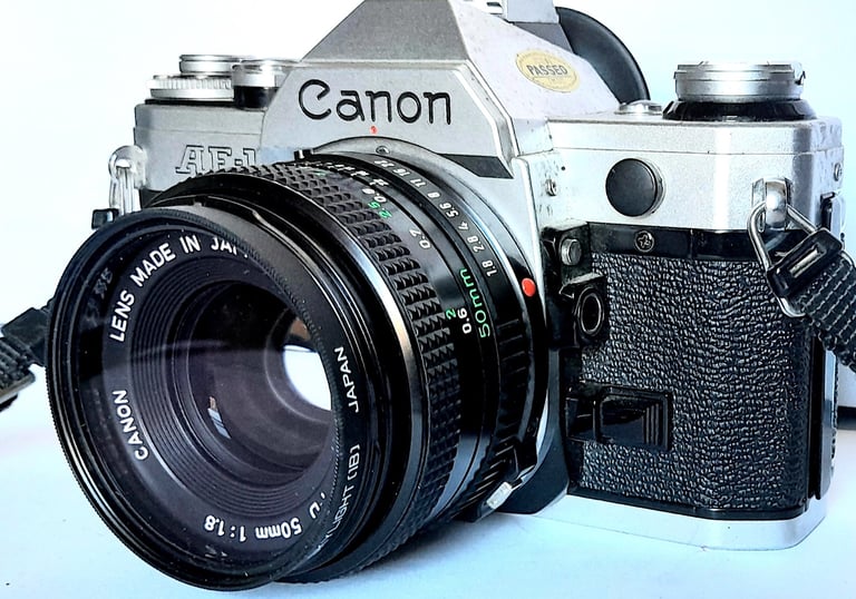 A CANON AE-1 - 35 mm FILM CAMERA SET - LENS, FLASH, LARGE CASE etc etc