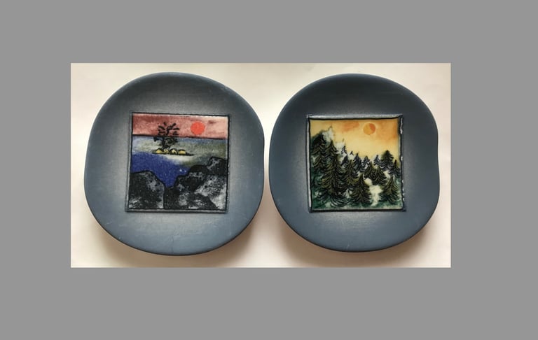 Helja Liukko-Sundstrom two wall plaques 11cm
