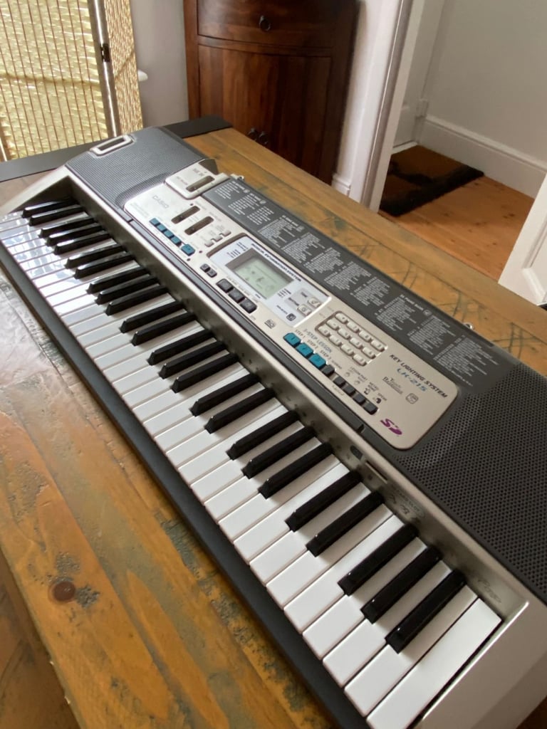 image for Casio Keylight Keyboard LK-215 and adjustable stand