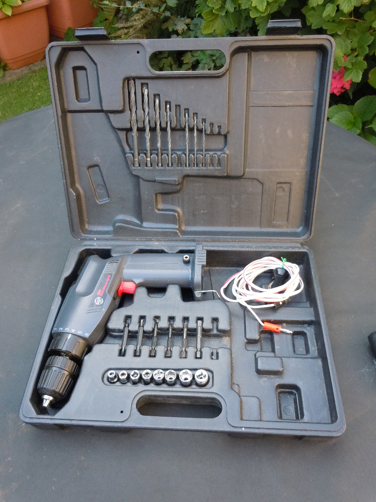 !2 Volt Drill/Driver adapted to run directly from an automobile lighter socket.