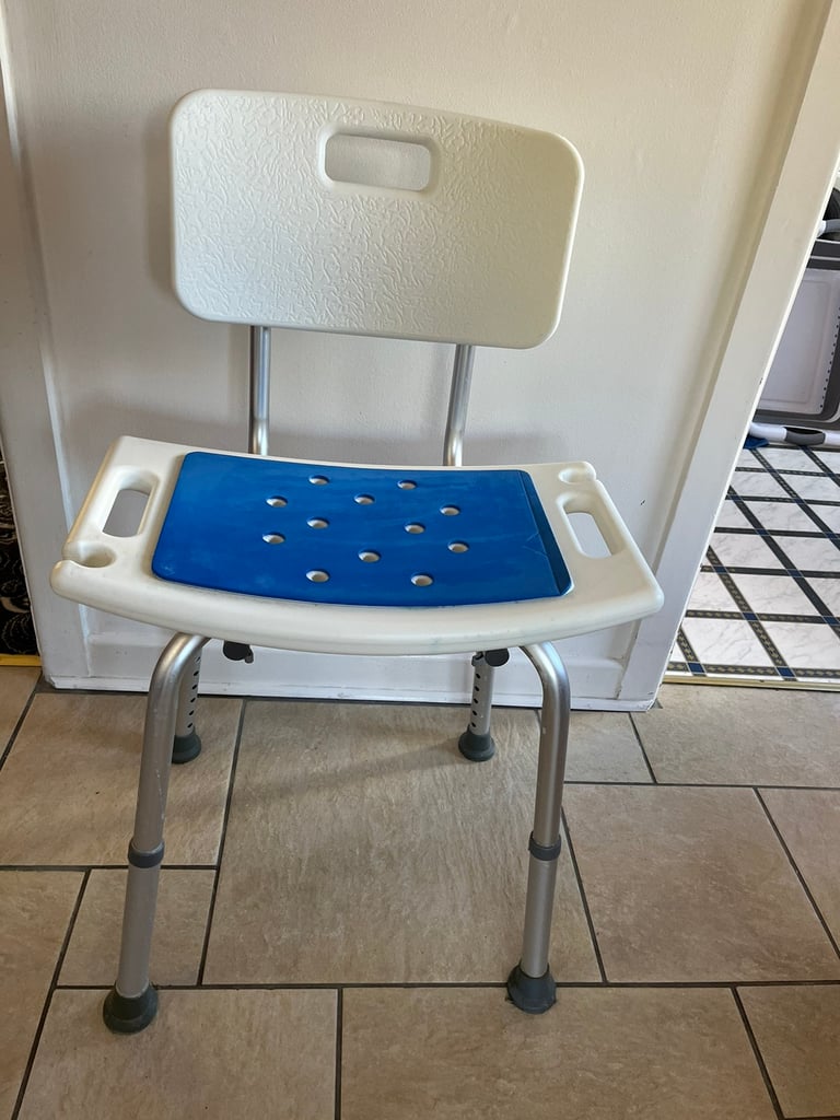 Shower seat adjustable with chair back
