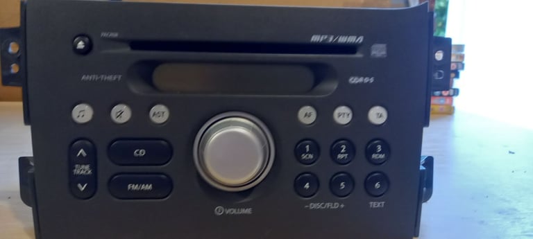 Panasonic Cd + radio car stereo with facia and mount