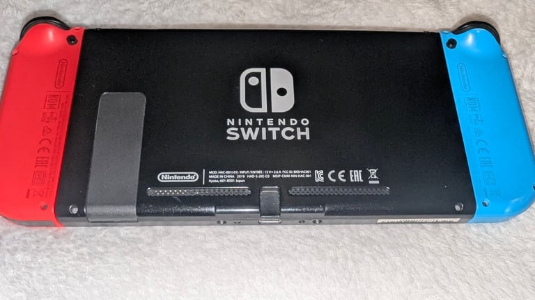 Nintendo switch bundle, boxed  with 9 games