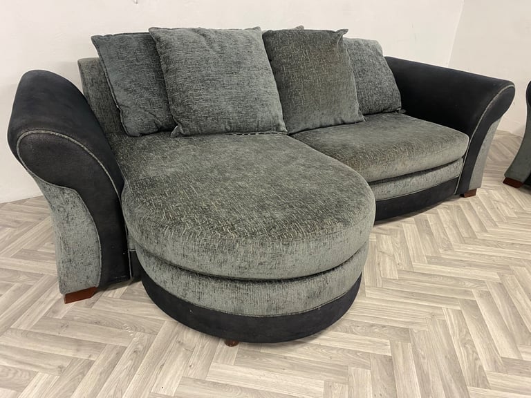 Lovely Reid’s grey fabric sofas and footstool 