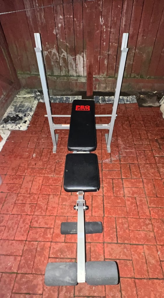 Weight lifting bench and 80 kgs worth of plates 