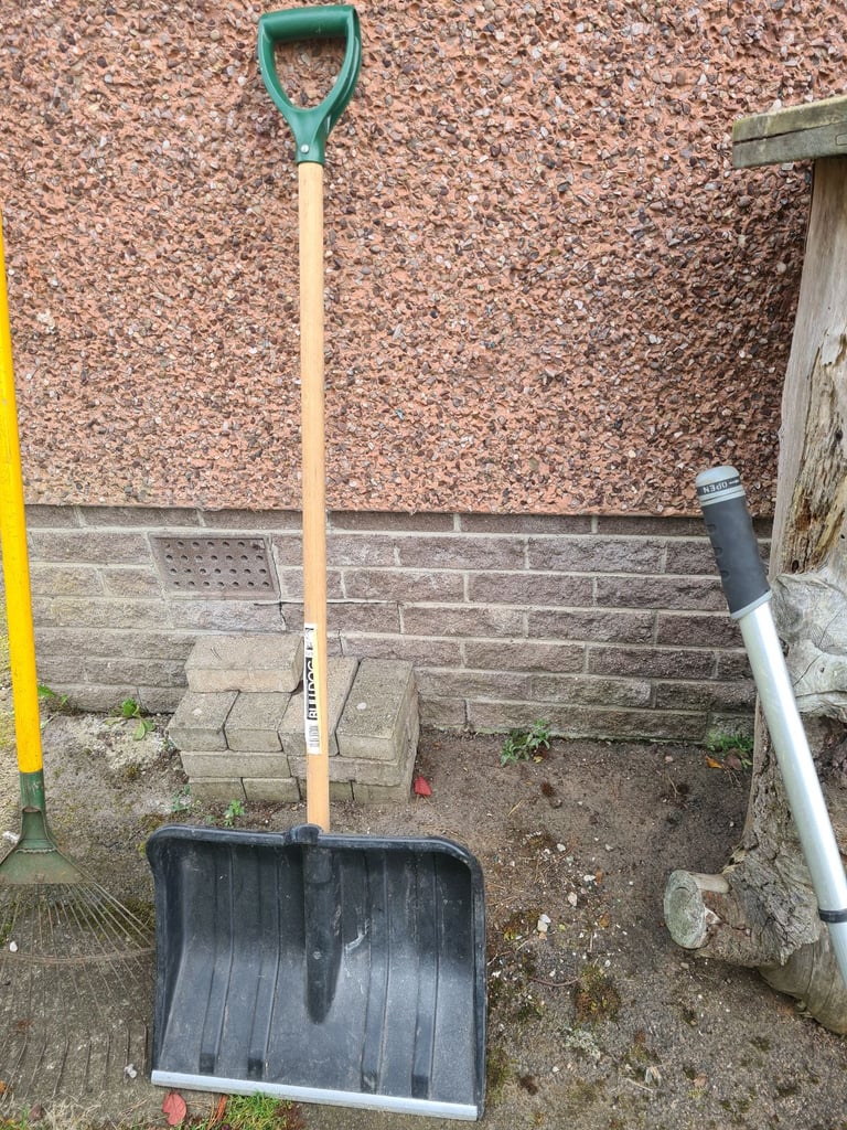 Garden tools snow shovel leaf rake loppers hoe