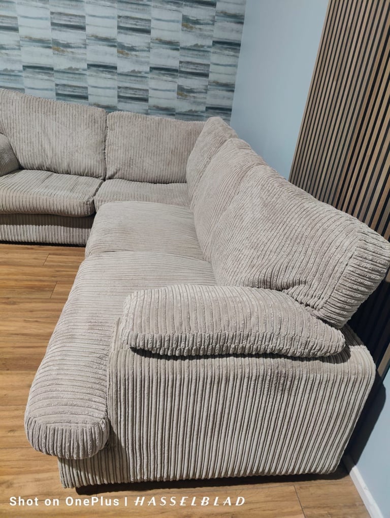 Large beige DFS Corner Sofa Bed  with footstool + free delivery