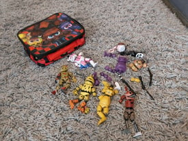 Five Nights at Freddys figures and lunchbox/case