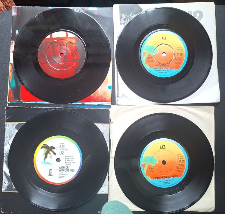 U2 vinyl singles 8 including a double single