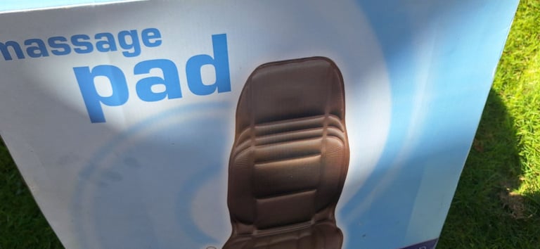 Massager pad can use in car or inside house its used one time in box but the box a little worn 