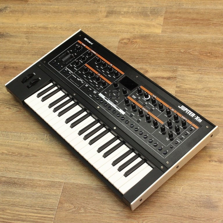 image for Roland Jupiter XM. Mint. Comes with box and leads
