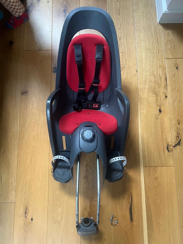 Hamax Caress bike seat with waterproof cover and Hamax child’s poncho 