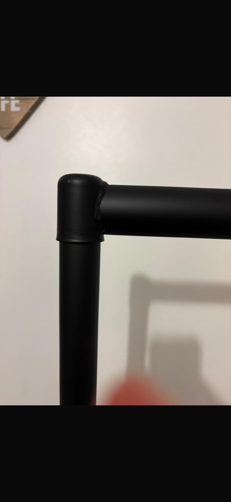 Black metal clothes rail 