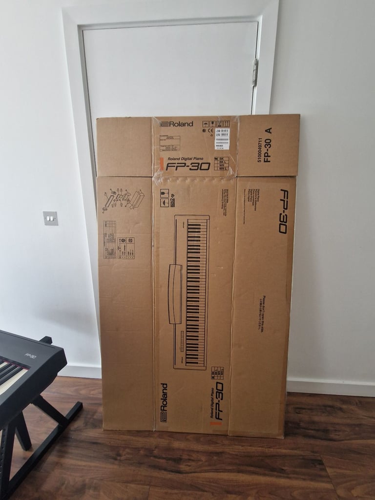 Roland FP-30 piano keyboard with a stand, Roland bench, pedal, professional headphones, cover, books