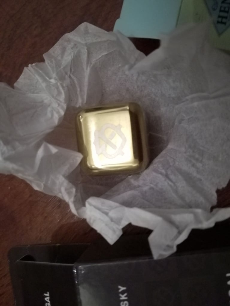 Chivas Regal whisky stones, Johnnie Walker pin badges, Hendricks Gin bottle stopper 