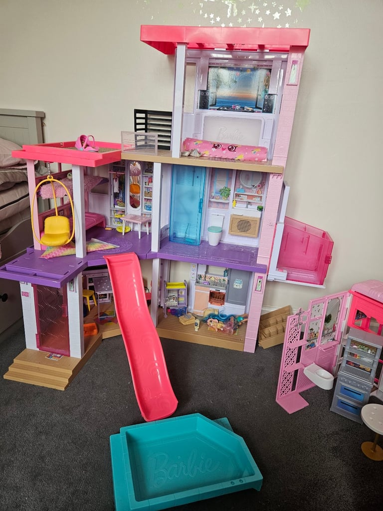 Barbie dreamhouse and barbie bundle