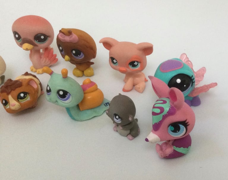 Bundle of Littlest Pet Shop toys includes rare lilac eyes various figures collectible 
