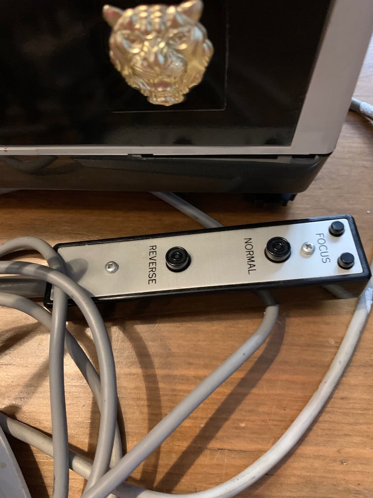 Gnome Jaguar slide projector, large fabric screen and slide holders