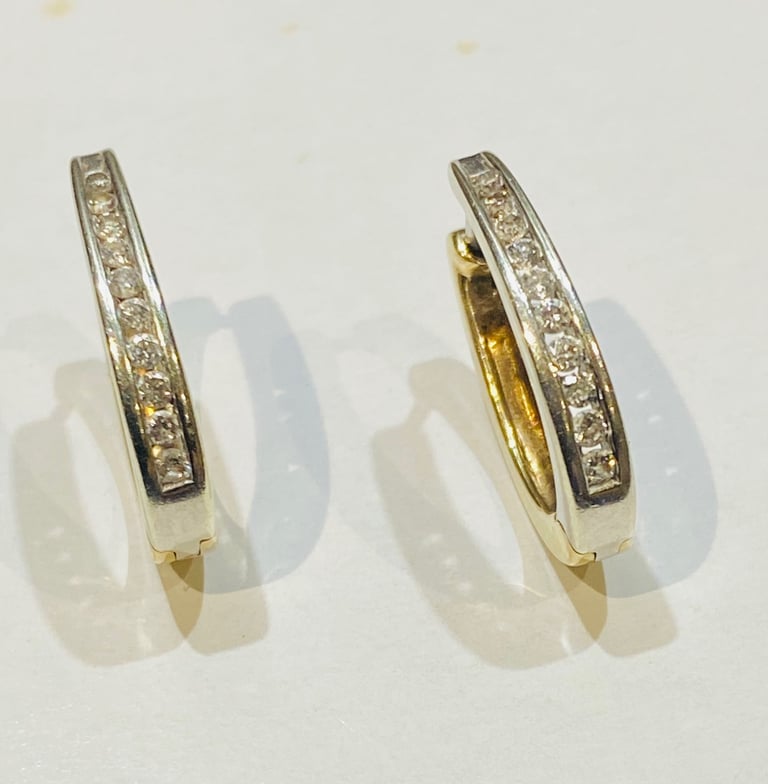 9ct diamond earrings.