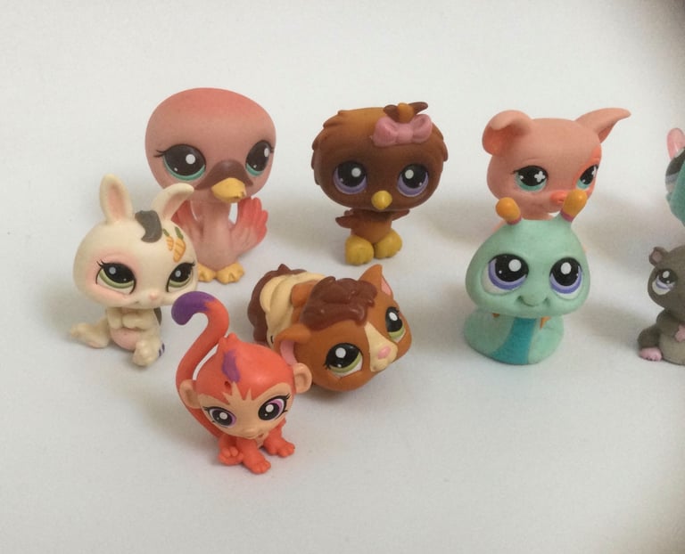 Bundle of Littlest Pet Shop toys includes rare lilac eyes various figures collectible 