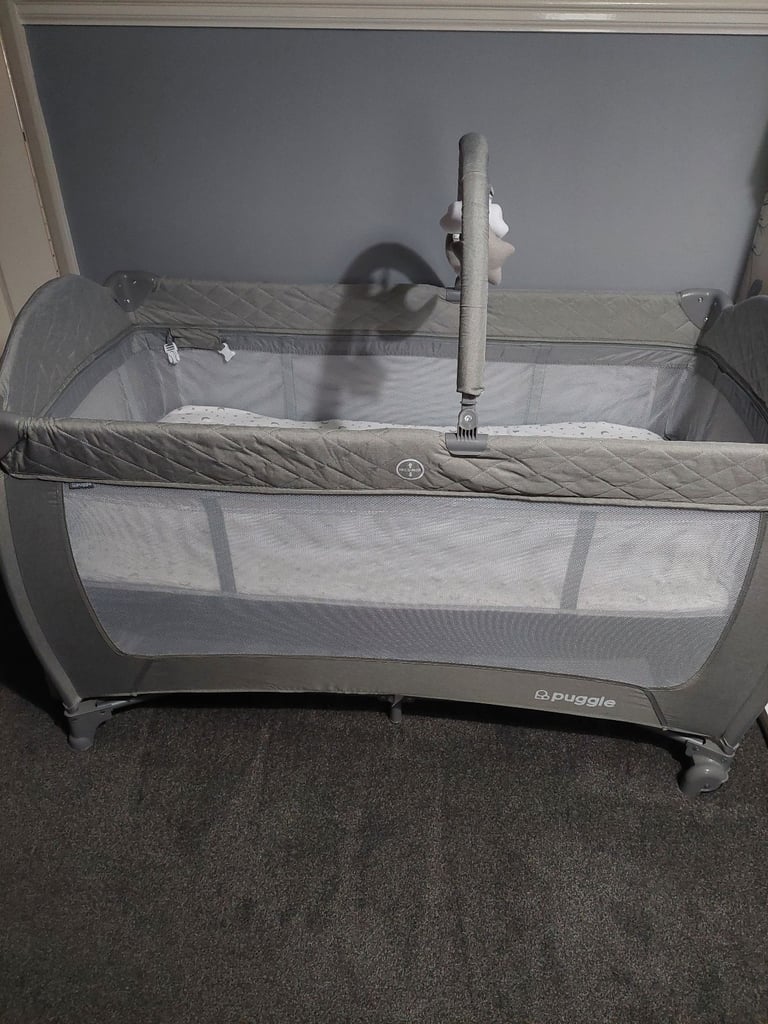 Brand new travel cot