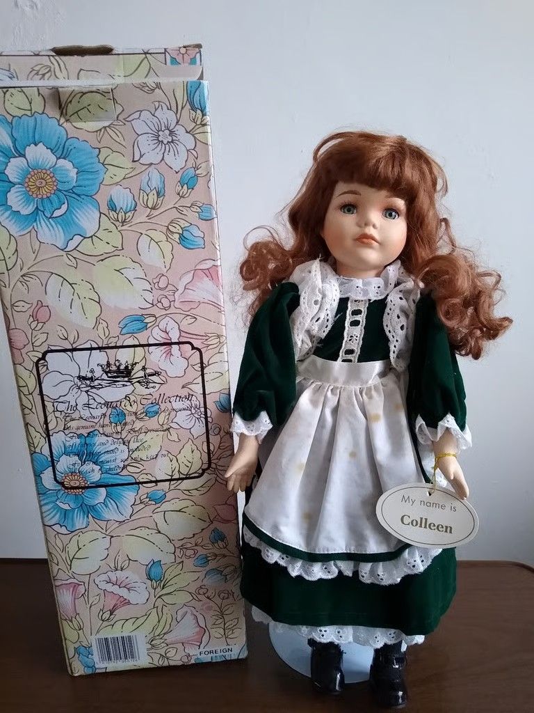 2 hand painted porcelain dolls from the Leonardo collection