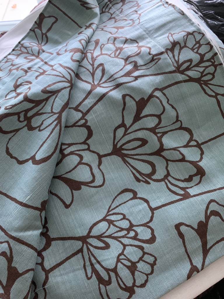 A pair of fully lined professionally made curtains 