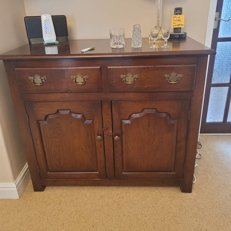 dark wood sideboard can deliver locally