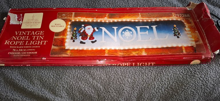 Brandnew noel tin rope light in box 