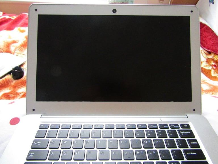 silver JOOMPER 14inch laptop tools in good condition lightly used 64GB own charger