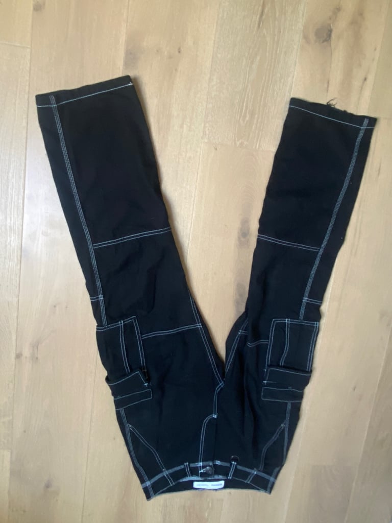 image for Black jeans with seams outlined 