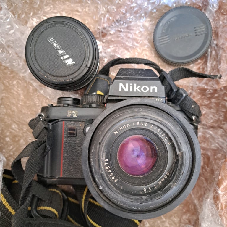 Nikon F1 and two lenses