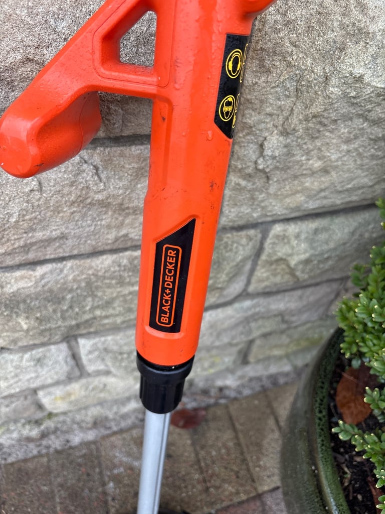 Black and Decker battery grass strimmer.