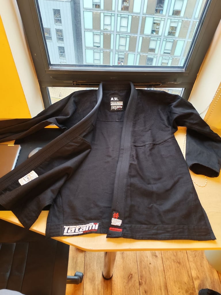 Tatami™  bjj gi with white belt, size A2L, used less than a week.  