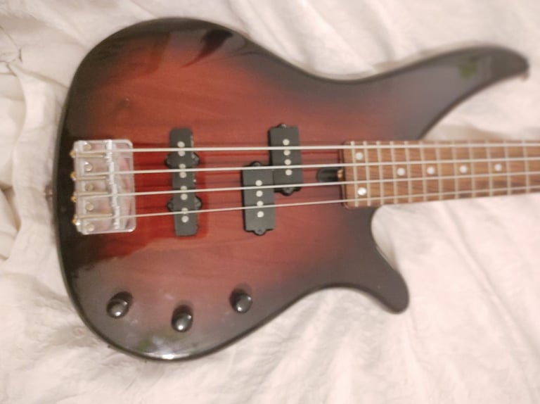 Yamaha RBX170 4 String Bass. Line 6 LD 15watt Bass Amp. Both in Mint Condition . Lots of Extras