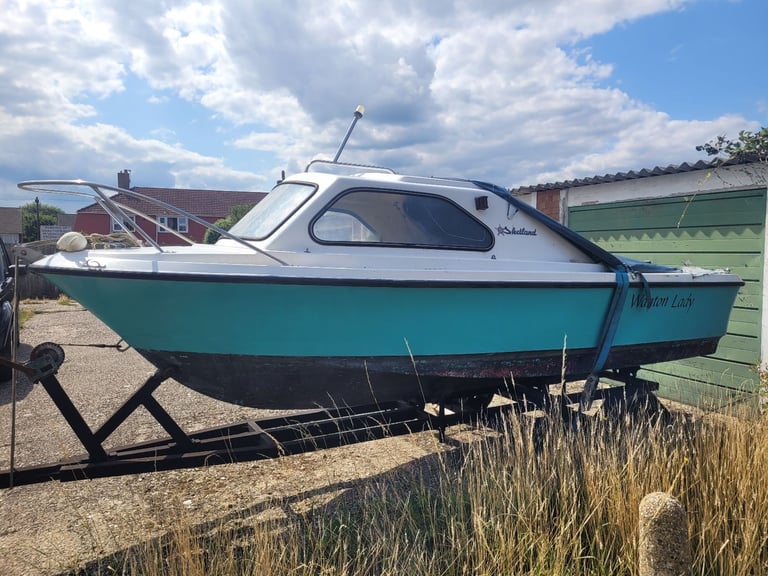 Shetland 460 cabin boat and road trailer.